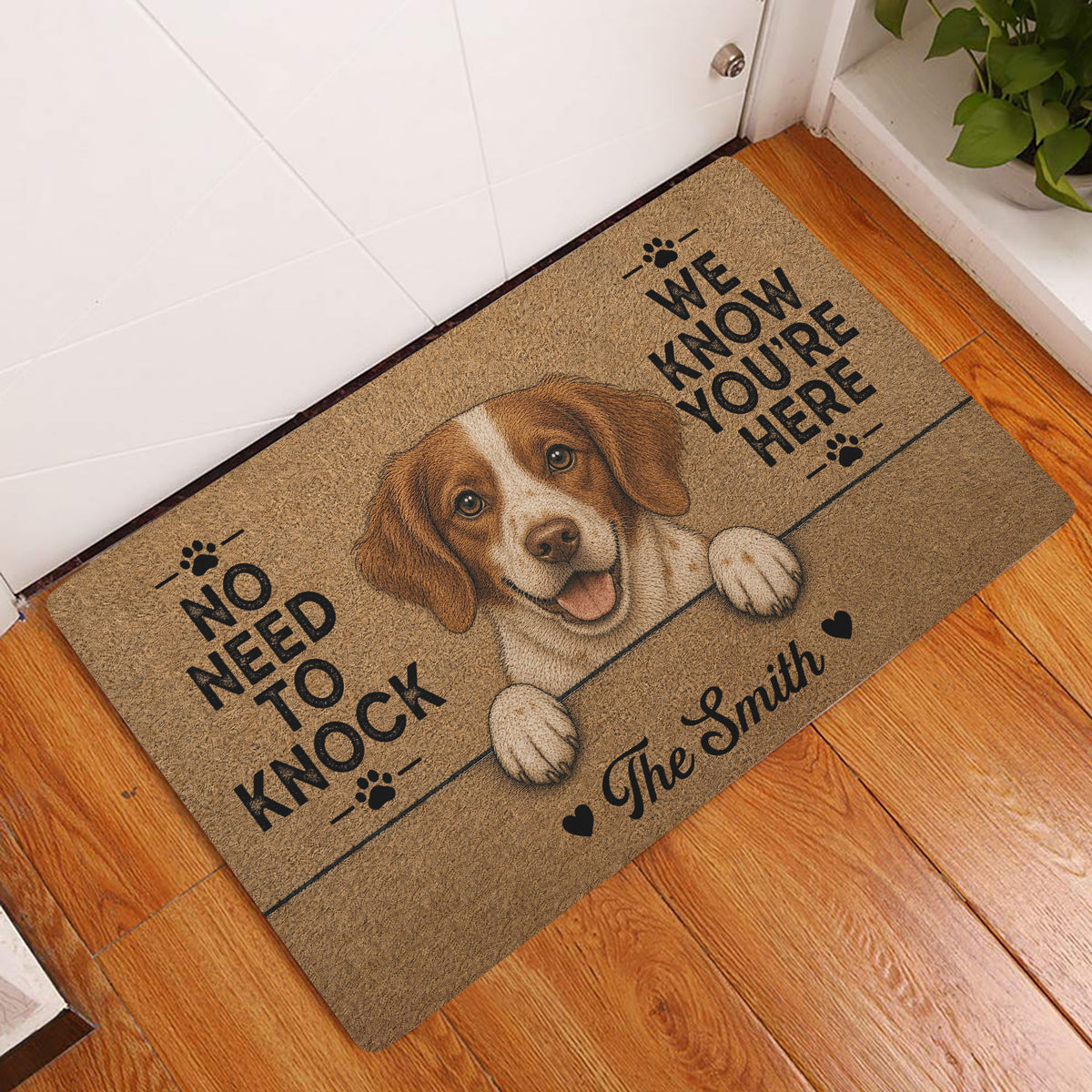 Brittany Spaniel door mat displayed at a home entrance on warm wood flooring