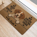 Brittany Spaniel entryway rug positioned beside a doorway on light wood flooring