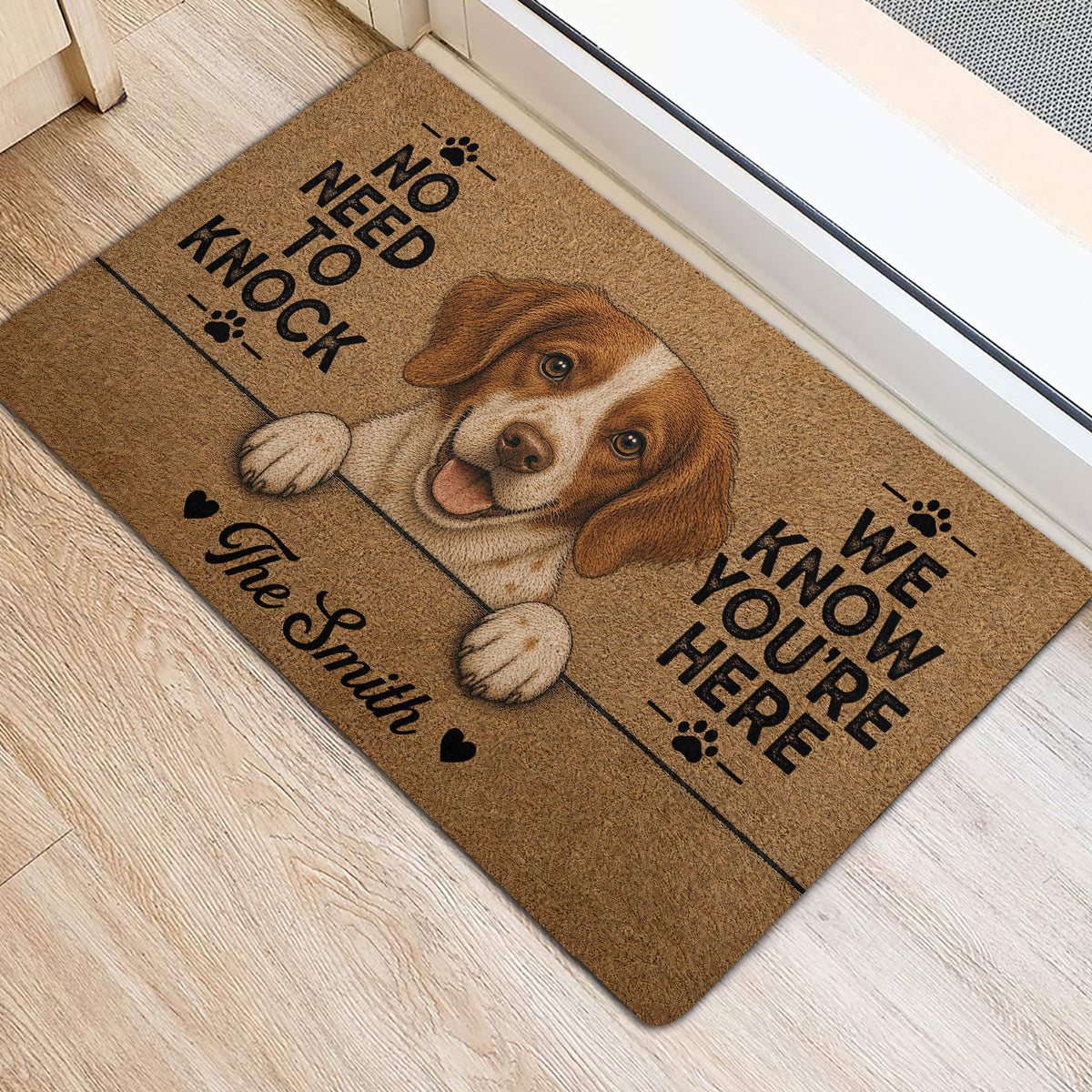 Brittany Spaniel entryway rug positioned beside a doorway on light wood flooring