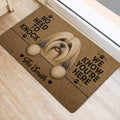 Lhasa Apso door mat staged at an indoor entrance, featuring a tan dog portrait and black paw print accents
