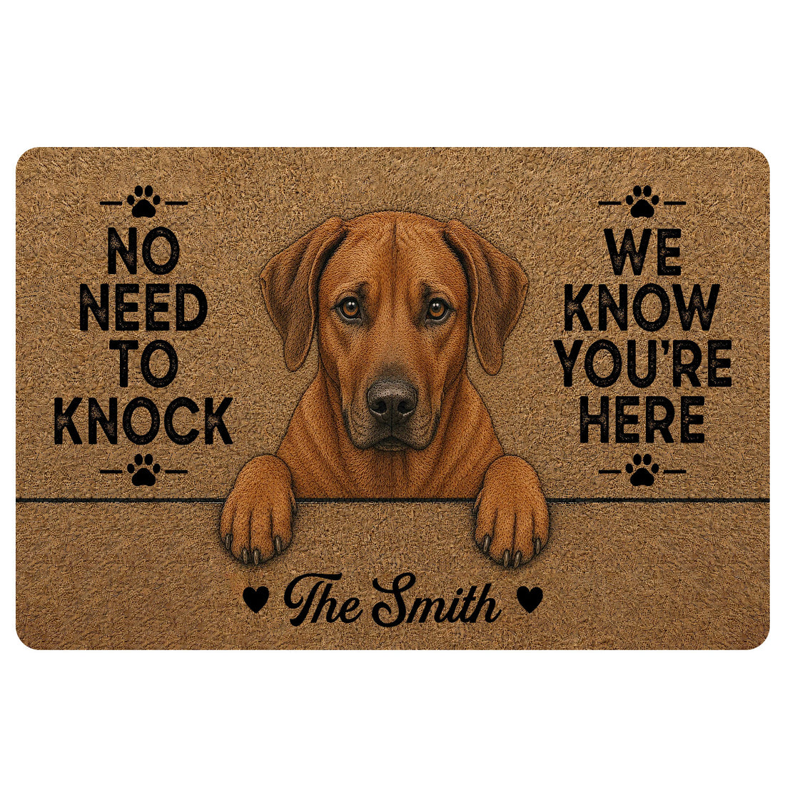 Custom family name Rhodesian Ridgeback dog doormat featuring a reddish brown floppy-eared dog peeking over a line, black paw prints, natural coir-look background and No Need to Knock We Know You’re Here quote.