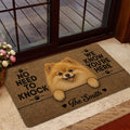 Pomeranian welcome mat styled near a glass door with a smiling fluffy dog illustration and brown textured artwork