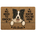 Border Collie doormat with a smiling dog portrait, paw prints, and playful entryway message