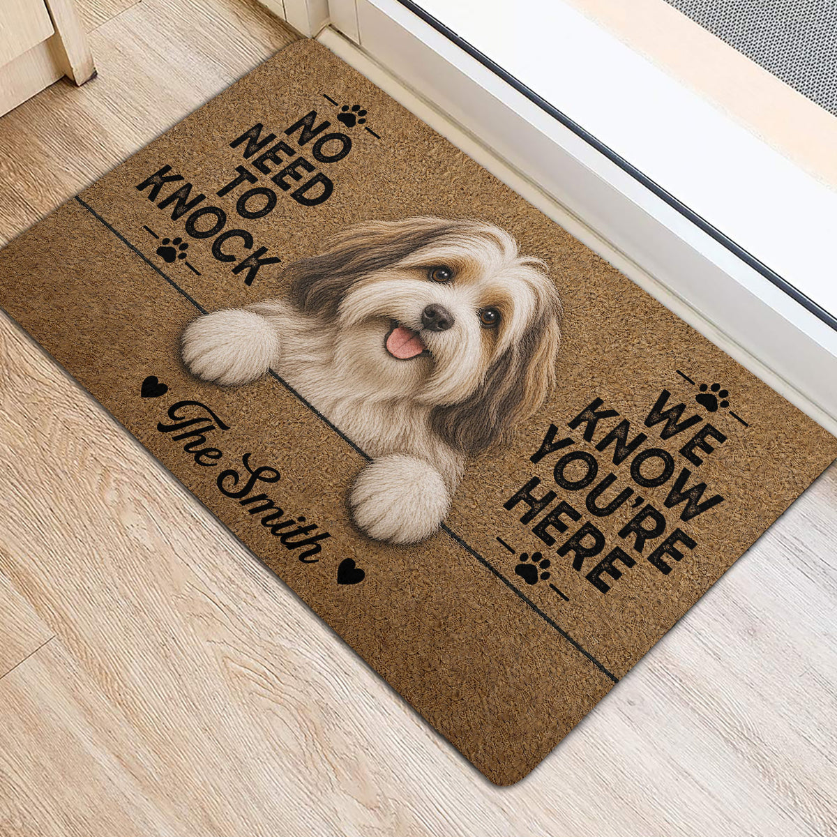 Havanese dog entryway mat shown beside a doorway on light wood flooring