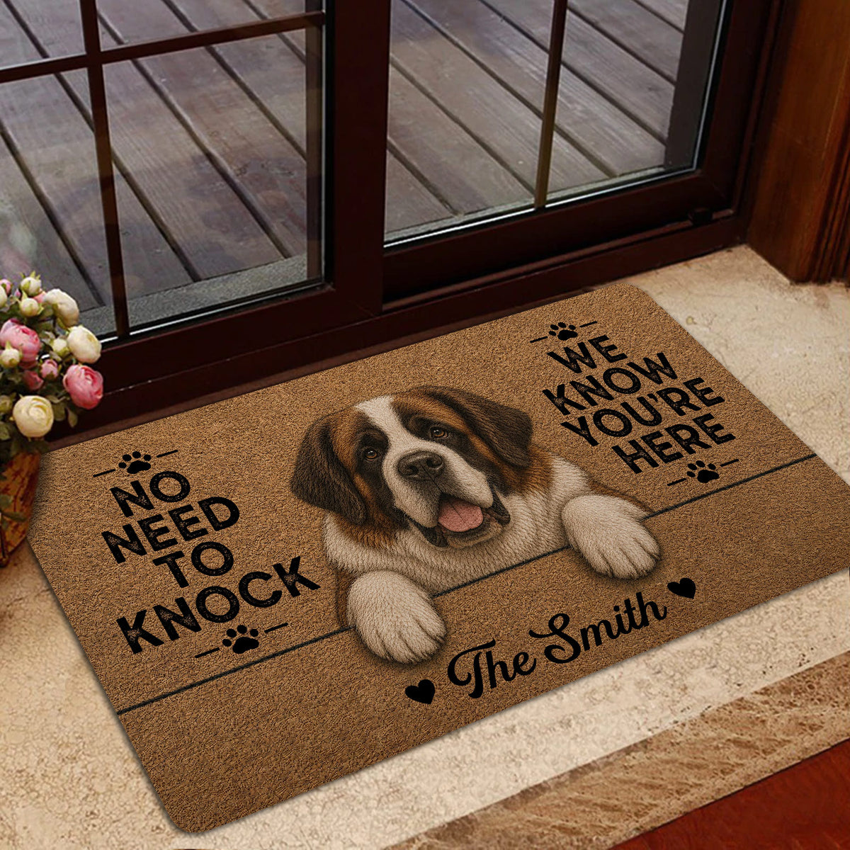 Saint Bernard doormat styled at a glass doorway with warm brown artwork and a welcoming dog theme