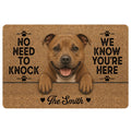 Staffordshire Bull Terrier doormat with a playful brown dog portrait, paw prints and a humorous entryway message