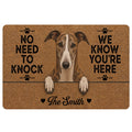 Greyhound doormat with a realistic dog portrait, paw prints and bold welcome message