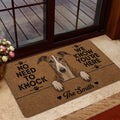 Greyhound welcome mat presented in a home entryway near glass doors and a floral arrangement