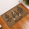 Basset Hound entryway rug displayed beside a front door on warm hardwood flooring