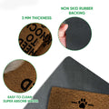 Close-up product feature view showing the textured printed top, rubber backing, and Maltese dog artwork