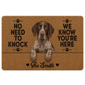 German Shorthaired Pointer doormat with a realistic dog portrait, paw prints, and bold humorous lettering on a warm brown background.