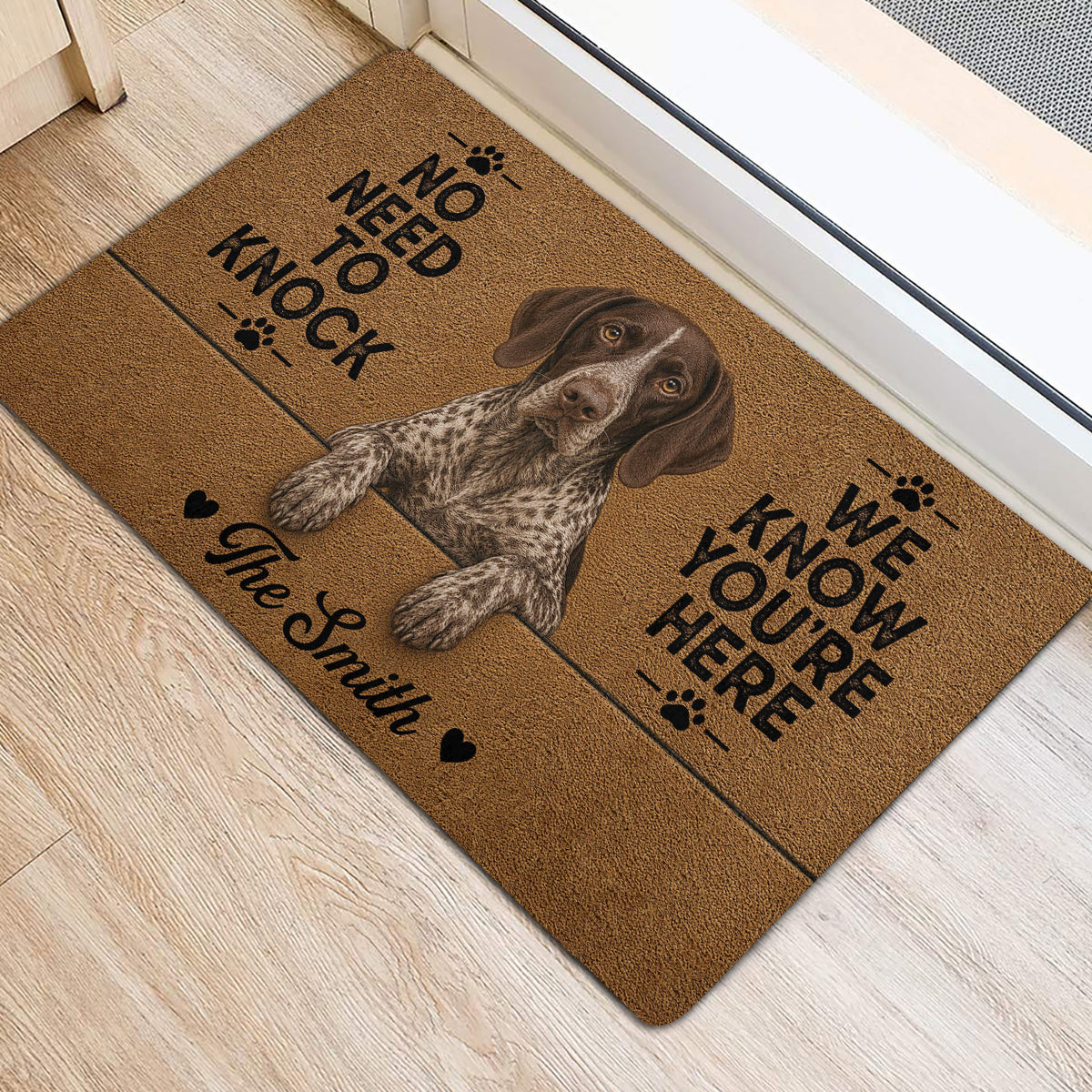 German Shorthaired Pointer door mat shown at an entrance, featuring a realistic dog portrait and bold black lettering.