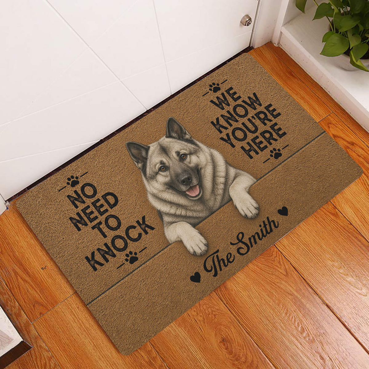 Norwegian Elkhound door mat displayed at a home entrance on warm wood flooring