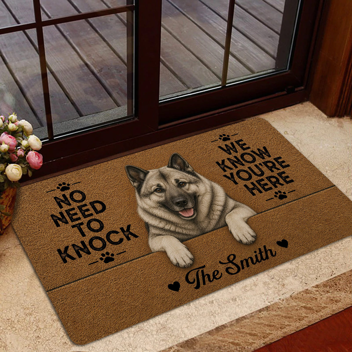Norwegian Elkhound entryway mat shown beside a glass door in a warmly decorated home