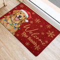 Holiday golden retriever welcome doormat shown beside an indoor doorway