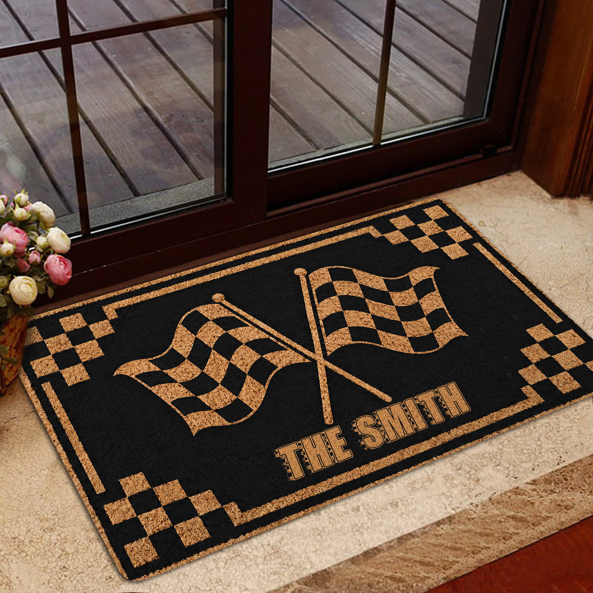 Motocross checkered flag doormat presented in a home entrance with glass doors and warm decor