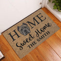Cane Corso welcome doormat displayed beside a white door on a warm wood floor