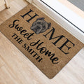 Cane Corso entryway rug positioned near a doorway with bold black lettering and dog portrait