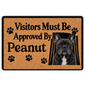 Tan French Bulldog doormat with black paw prints, bold welcome message, and portrait artwork