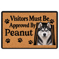 Husky doormat with blue-eyed dog portrait, paw prints and bold black entryway lettering