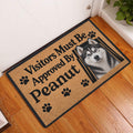 Husky entryway doormat displayed by a white door on a warm wood floor