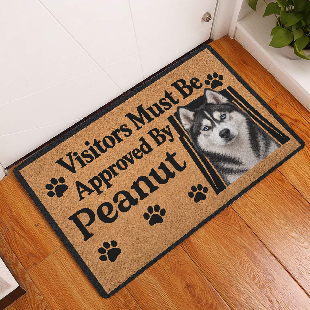 Husky entryway doormat displayed by a white door on a warm wood floor