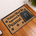 Labrador Retriever doormat displayed at an indoor doorway on a warm wood floor