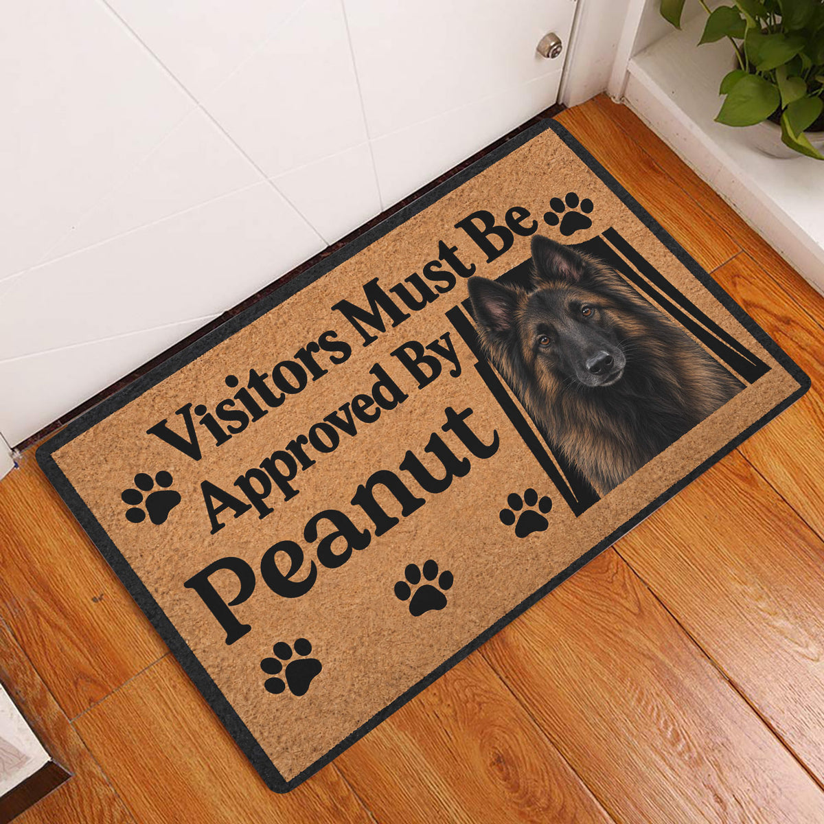 Belgian Shepherd entryway mat displayed on a warm wood floor beside a white door