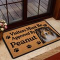 Rough Collie welcome mat displayed inside a doorway near a glass door and entry rug