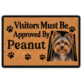 Tan Yorkie doormat with black paw prints, a bold welcome message, and Yorkshire Terrier portrait