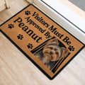 Yorkshire Terrier doormat styled at an indoor doorway with tan artwork and black paw prints