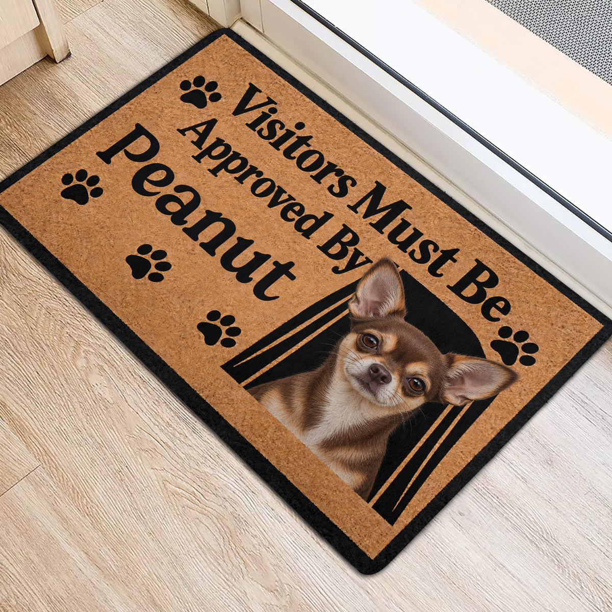 Chihuahua doormat positioned beside a doorway on a light wood floor