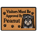 Miniature Schnauzer doormat with a black-and-tan design, paw prints, and a playful visitor approval message