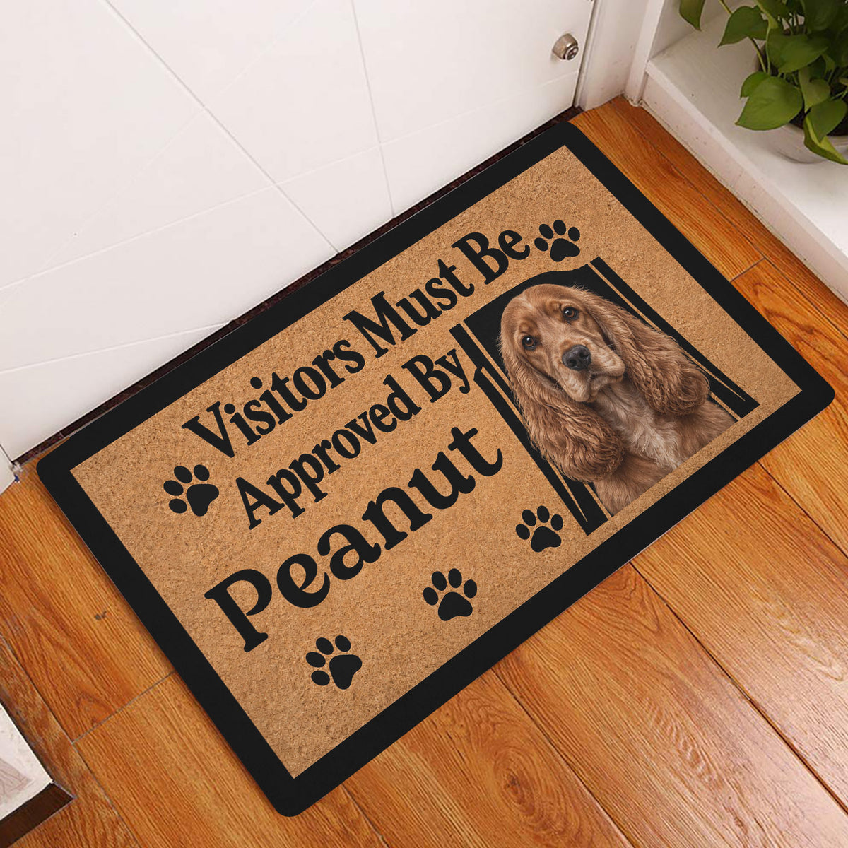 English Cocker Spaniel welcome doormat styled by a white door on a wood floor