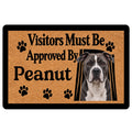 American Staffordshire doormat with a realistic dog portrait, paw prints, and bold black lettering on a tan design