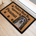 Front door mat featuring an American Staffordshire portrait, paw prints, and bold black lettering