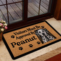 Dalmatian welcome doormat shown inside a home near a glass door and entryway