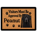 Curly Coated Retriever doormat with black dog portrait, paw prints, and a playful visitor message