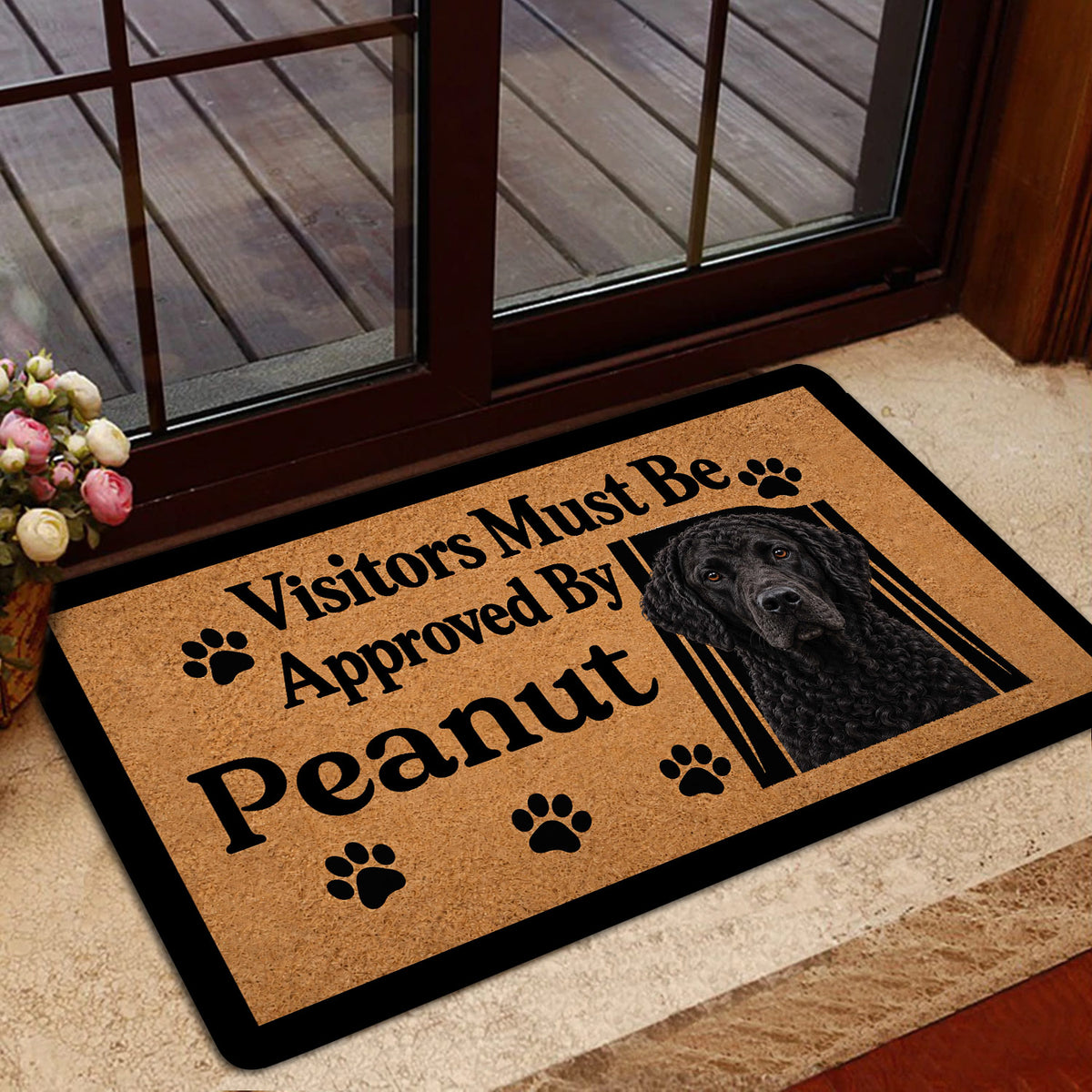 Curly Coated Retriever doormat styled near a glass door with a warm dog-themed welcome design