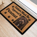Labradoodle front door mat featuring a dog portrait, paw prints, and bold lettering near a doorway