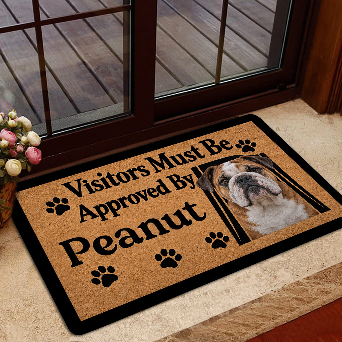 English Bulldog doormat styled at a home entrance near a glass door and indoor flooring