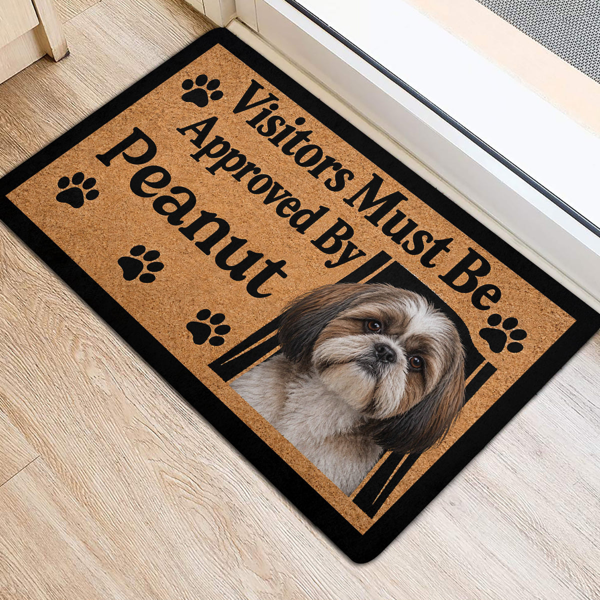 Shih Tzu dog portrait doormat with paw prints shown near a bright home entrance