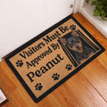 Miniature Pinscher doormat displayed by a white entry door on a warm wood floor