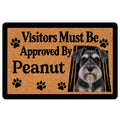 Miniature Schnauzer doormat with a realistic dog portrait, paw prints, and bold black lettering on a tan background
