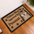 Shiba Inu doormat styled at an indoor entryway beside a white door and wood floor