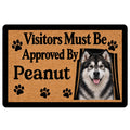 Alaskan Malamute doormat with a black-and-white dog portrait, paw prints, and a playful welcome message