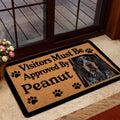 Bluetick Coonhound doormat styled in a home entrance with a glass door and warm decor