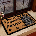 Great Dane doormat styled inside a home entrance near a glass door and wood deck