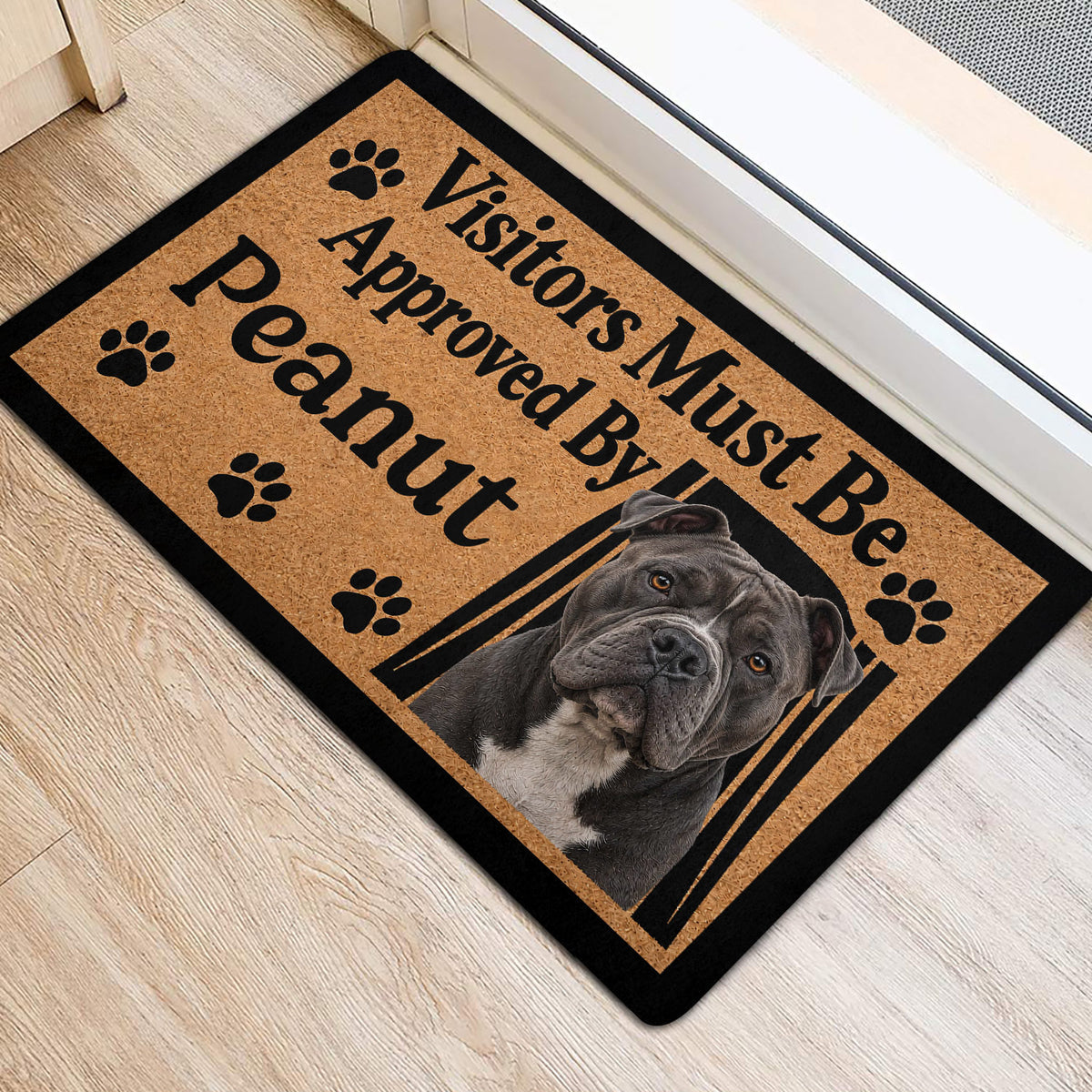 American Bully door mat staged at an indoor entrance with paw prints and bold black lettering