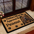 Bloodhound doormat styled at a home entrance with paw print accents and dog portrait